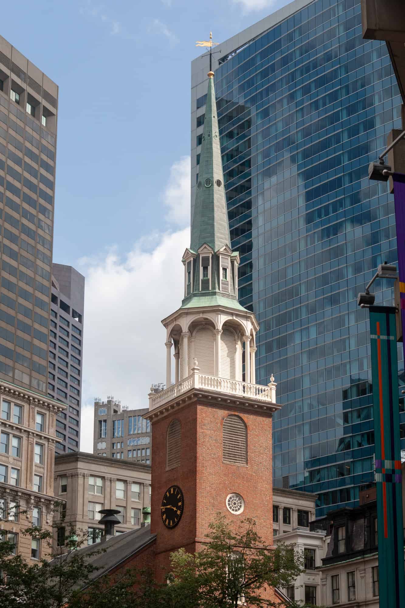 the old south meeting house looks small and historic set in among the tall glass buildings nearby, the meeting house is on our list of things to do with one day in boston