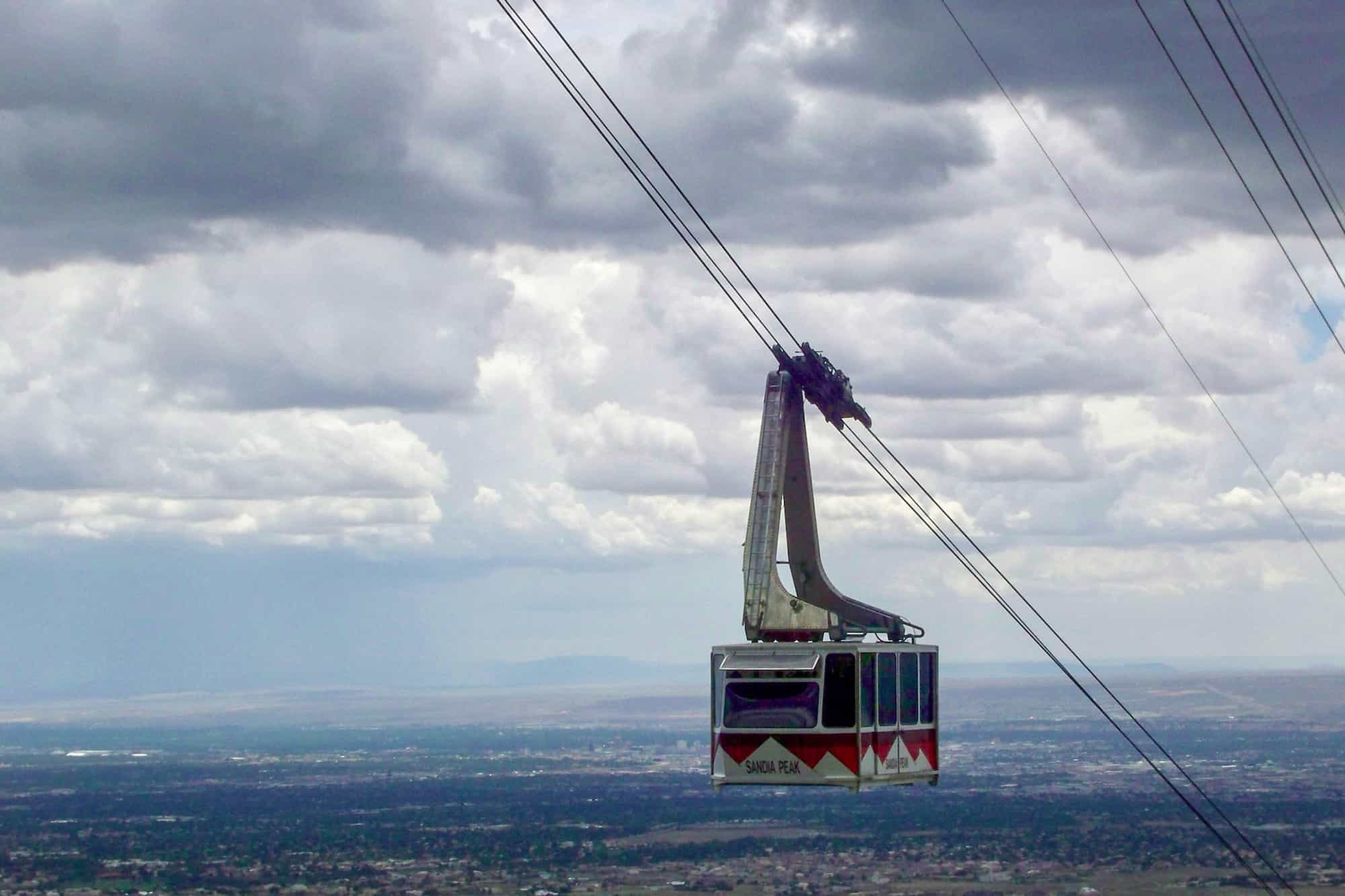 on a road trip from houston to grand canyon, the sandia peak tramway is a great stop to see views of albuqueque, the tram car is seen here