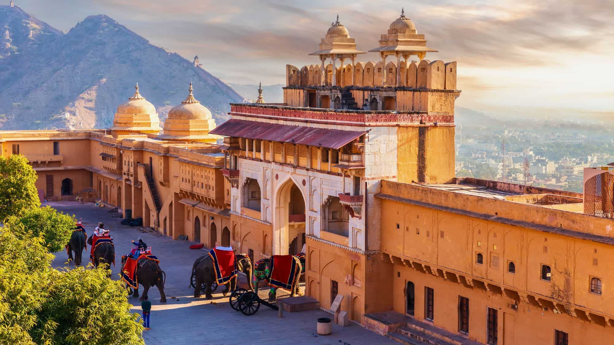 Elephant riders in Amber Fort, famous tourist attraction of Jaipur, India