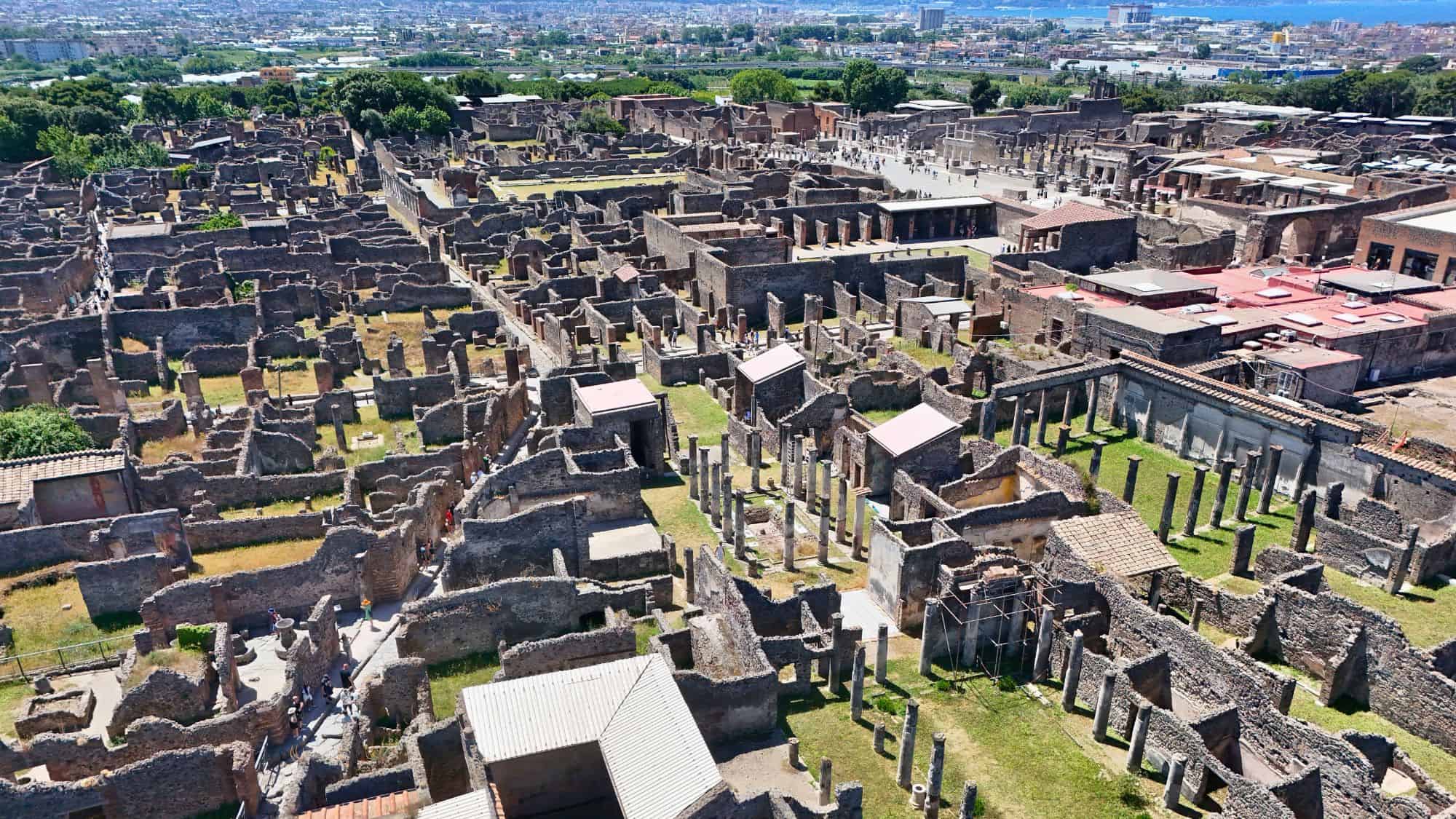 aerial view of the Ancient roman city of Pompeii on the shadow of Mount Vesuvius volcano
