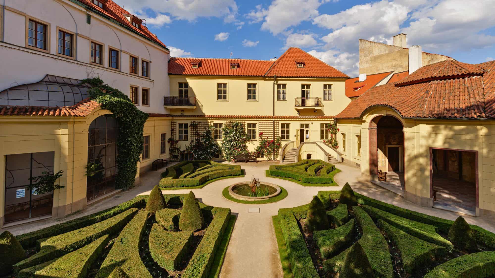 Prague, Czech republic - June 8, 2024: Ornamental garden with a central fountain and manicured hedges in vrtba garden, a hidden gem of baroque landscape architecture in prague
