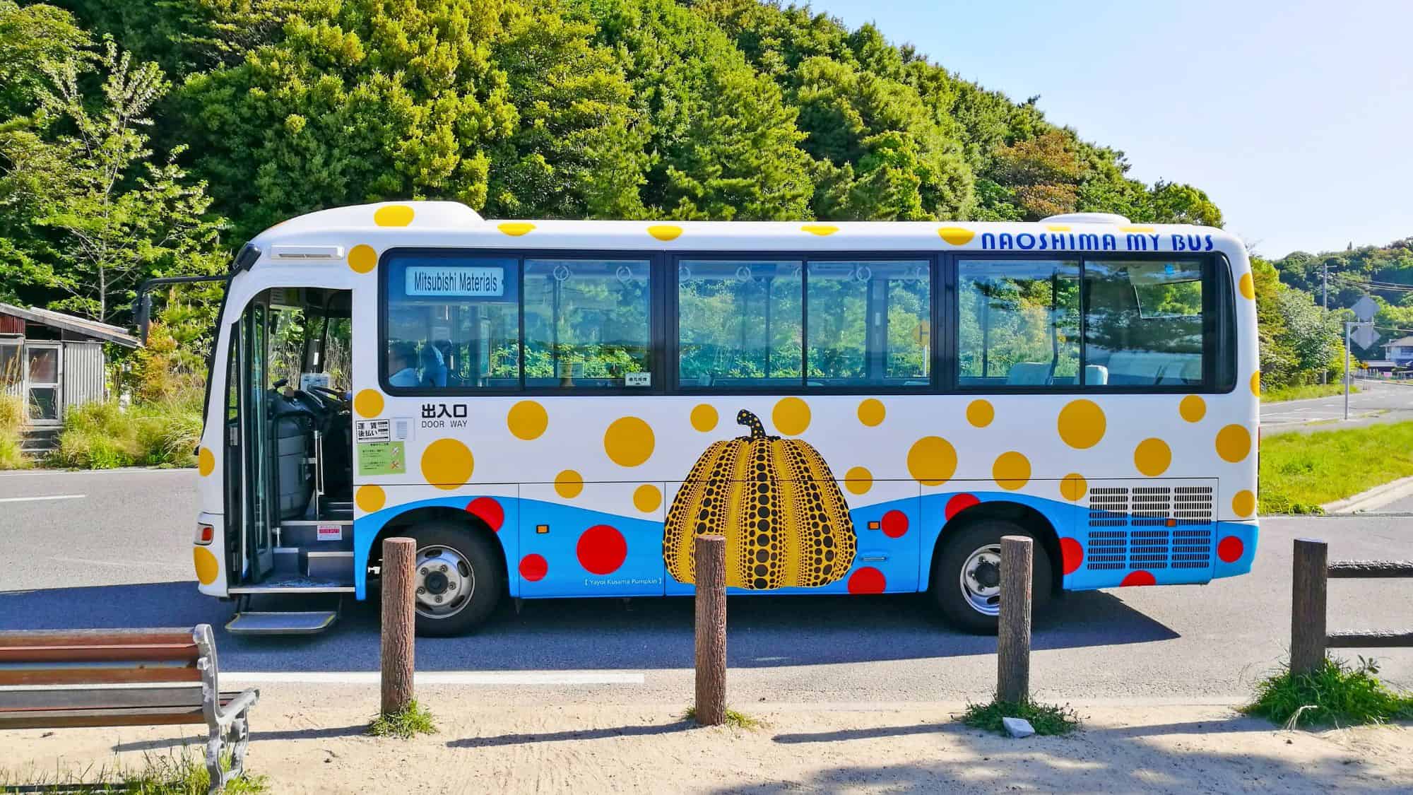 Naoshima, Japan - 11.05.2017 : Yayoi Kusama’s iconic Yellow pumpkin icon bus at island town Japan’s Seto Inland Sea.