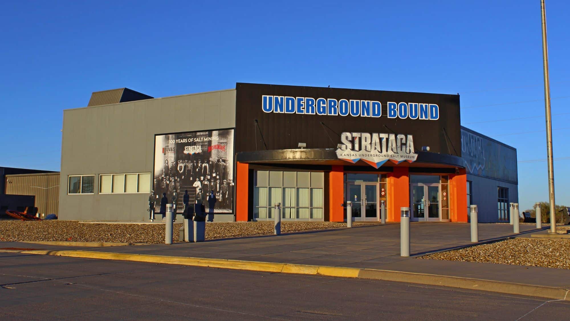 The entrance to Strataca, Kansas Underground Salt Museum, features bold signage reading “Underground Bound” and a historical mining photo.